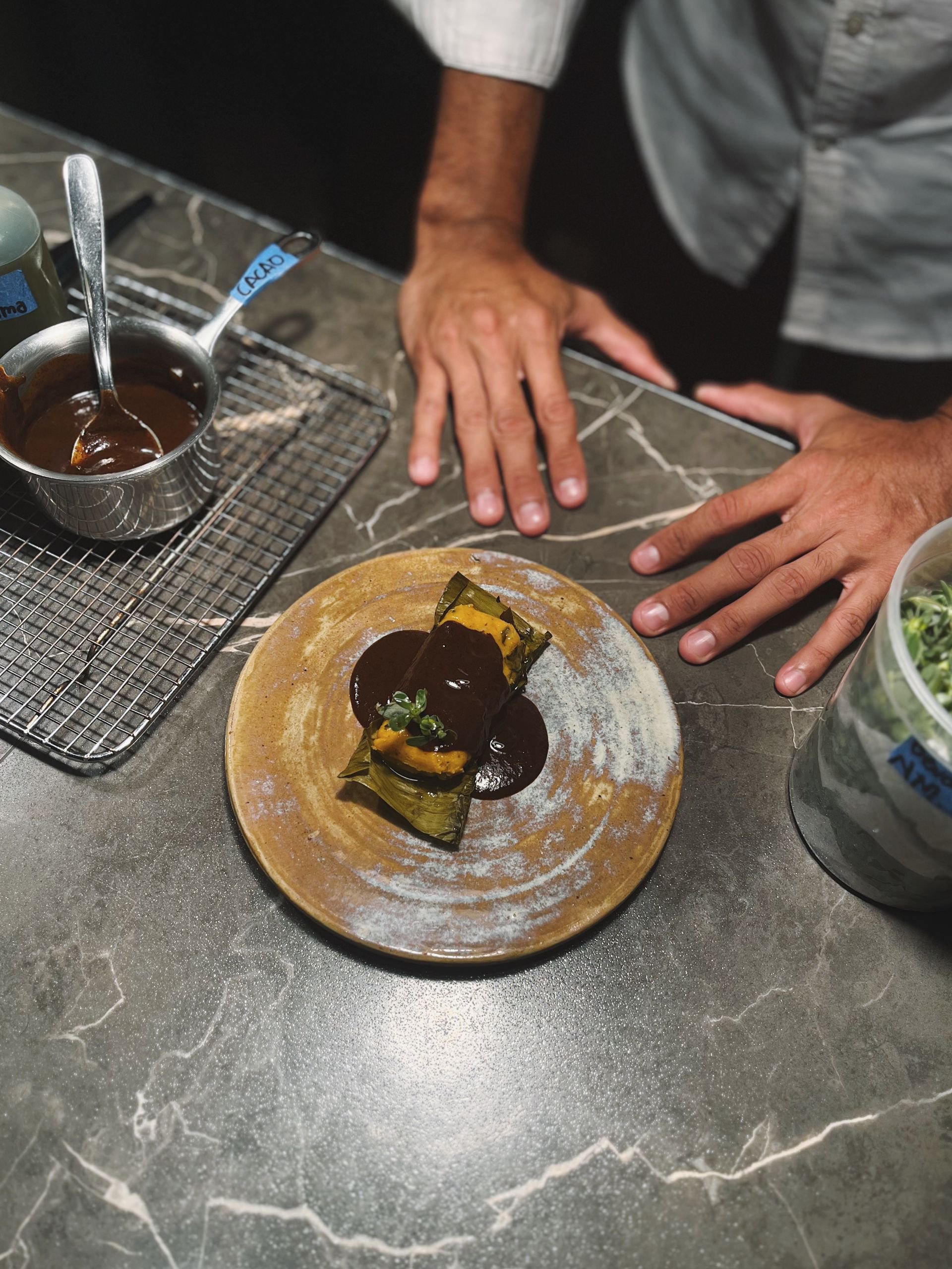 Tamal de Maíz, Codorniz y Mole de Sandía por NM Culinary en El Xolo