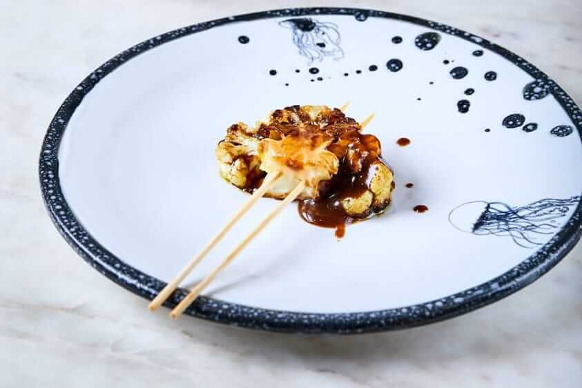Coliflor con Geisha del chef Mario Castrellón